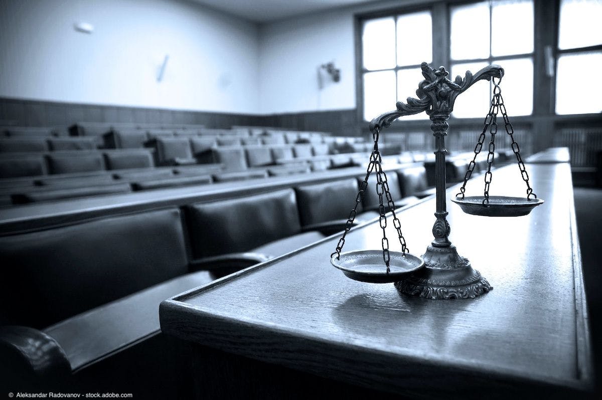 Decorative scales of justice in the courtroom | Image Credit: ©  Aleksandar Radovanov - stock.adobe.com 